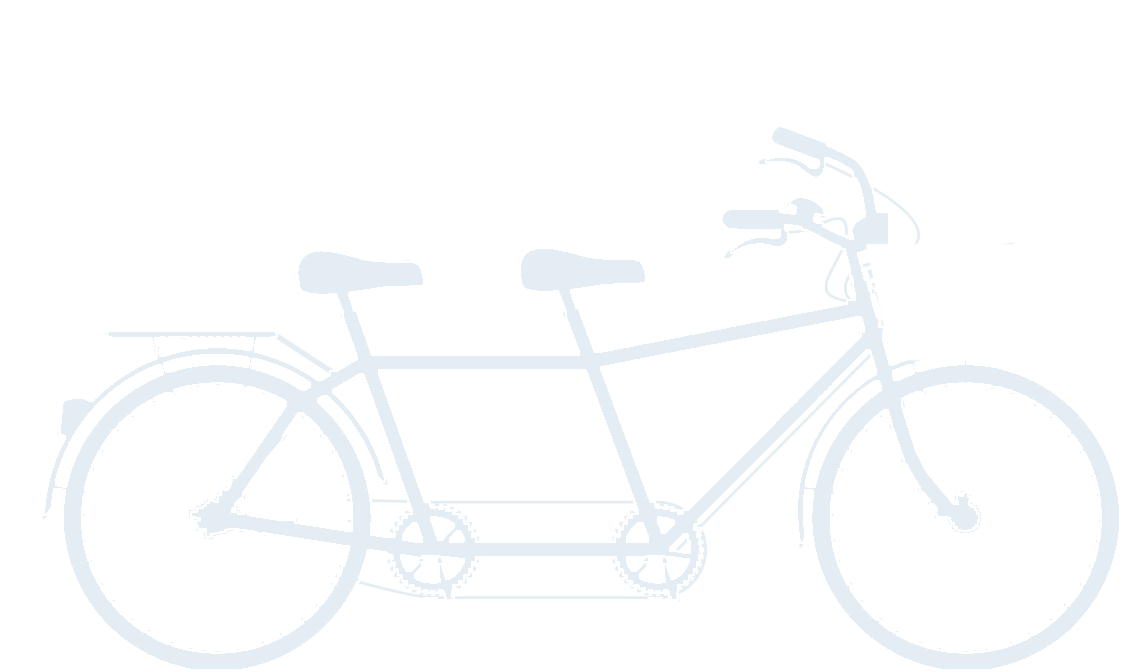 A tandem bicycle with a basket of hearts